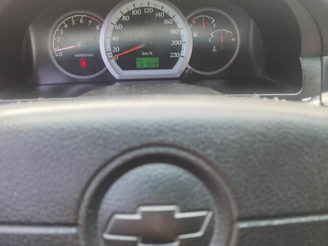 Белый Шевроле Лачетти, объемом двигателя 1.8 л и пробегом 170 тыс. км за 3900 $, фото 9 на Automoto.ua