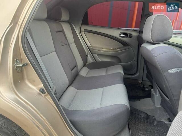 Бежевий Шевроле Лачетті, об'ємом двигуна 1.8 л та пробігом 216 тис. км за 3990 $, фото 10 на Automoto.ua