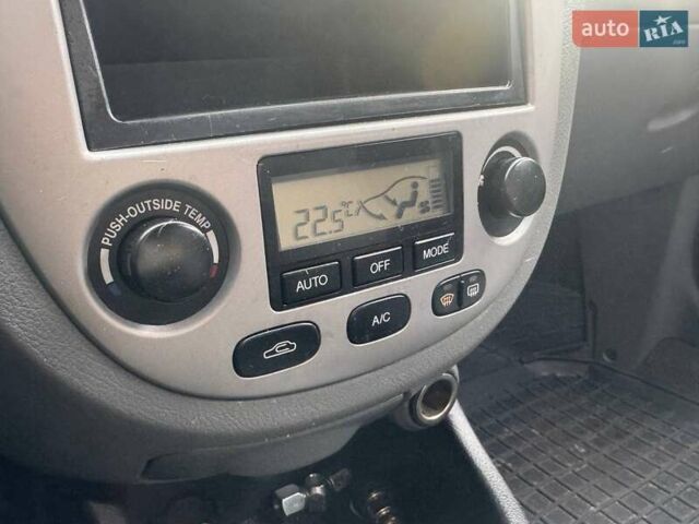 Бежевий Шевроле Лачетті, об'ємом двигуна 1.8 л та пробігом 216 тис. км за 3990 $, фото 20 на Automoto.ua