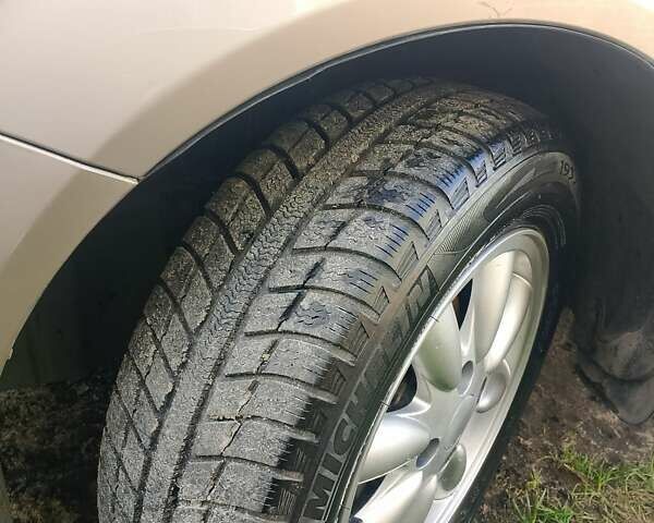 Бежевый Шевроле Лачетти, объемом двигателя 1.8 л и пробегом 315 тыс. км за 3700 $, фото 6 на Automoto.ua