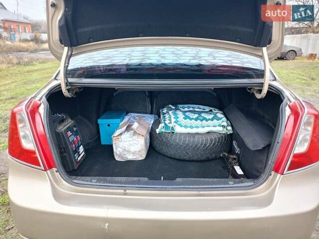 Бежевый Шевроле Лачетти, объемом двигателя 1.6 л и пробегом 298 тыс. км за 3600 $, фото 16 на Automoto.ua