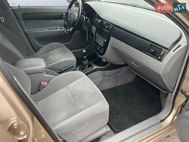 Бежевий Шевроле Лачетті, об'ємом двигуна 1.8 л та пробігом 212 тис. км за 4200 $, фото 10 на Automoto.ua