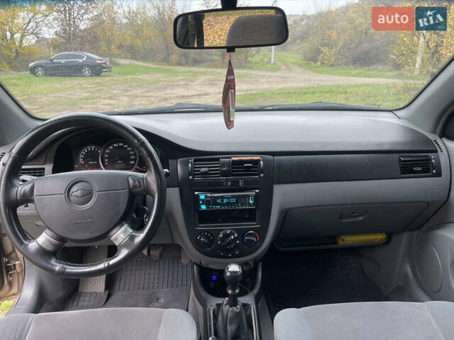 Бежевий Шевроле Лачетті, об'ємом двигуна 1.8 л та пробігом 253 тис. км за 3900 $, фото 16 на Automoto.ua