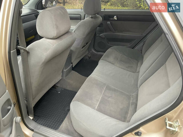 Бежевий Шевроле Лачетті, об'ємом двигуна 1.8 л та пробігом 253 тис. км за 3900 $, фото 15 на Automoto.ua