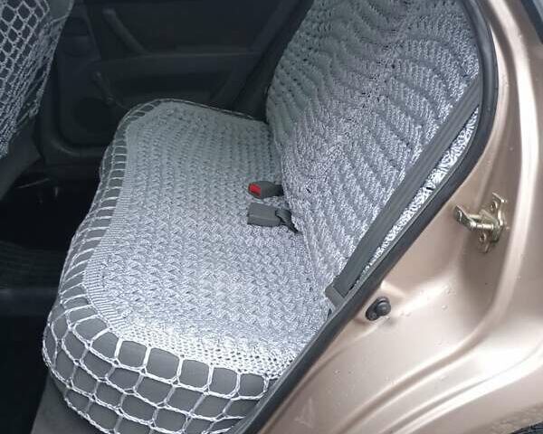 Бежевий Шевроле Лачетті, об'ємом двигуна 1.6 л та пробігом 273 тис. км за 3400 $, фото 5 на Automoto.ua