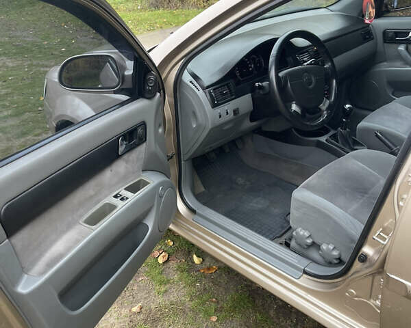 Бежевий Шевроле Лачетті, об'ємом двигуна 1.8 л та пробігом 253 тис. км за 3900 $, фото 13 на Automoto.ua