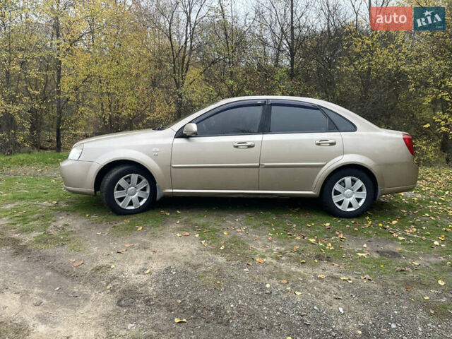 Бежевий Шевроле Лачетті, об'ємом двигуна 1.8 л та пробігом 253 тис. км за 3900 $, фото 5 на Automoto.ua