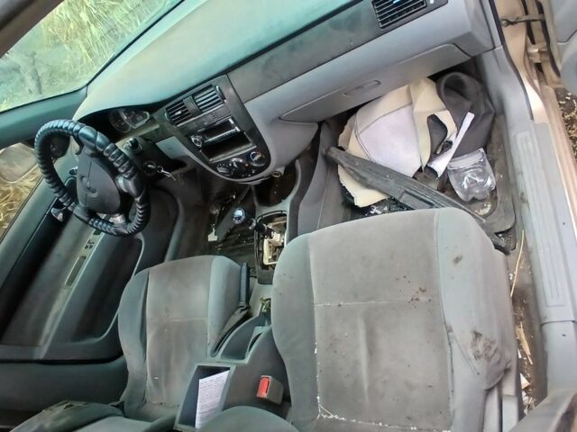 Бежевий Шевроле Лачетті, об'ємом двигуна 1.8 л та пробігом 300 тис. км за 960 $, фото 6 на Automoto.ua