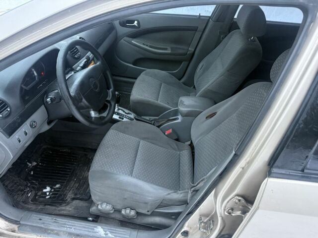 Бежевый Шевроле Лачетти, объемом двигателя 1.6 л и пробегом 404 тыс. км за 1975 $, фото 10 на Automoto.ua