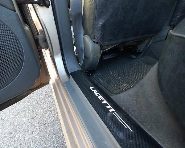 Бежевий Шевроле Лачетті, об'ємом двигуна 1.8 л та пробігом 249 тис. км за 4500 $, фото 7 на Automoto.ua