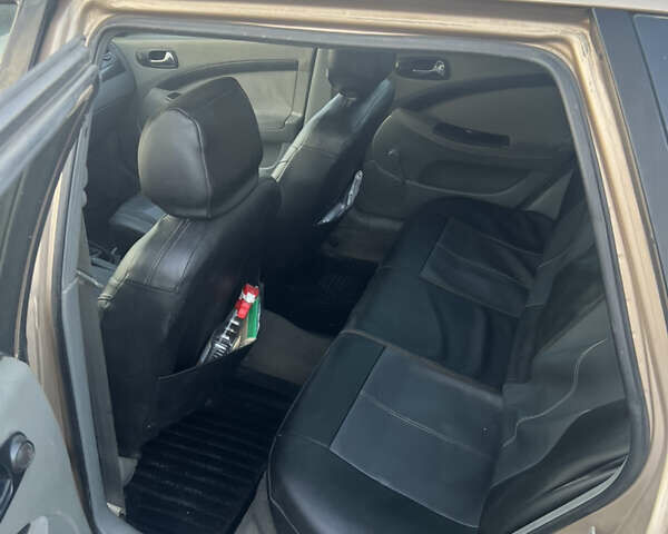 Бежевий Шевроле Лачетті, об'ємом двигуна 1.8 л та пробігом 291 тис. км за 3500 $, фото 7 на Automoto.ua