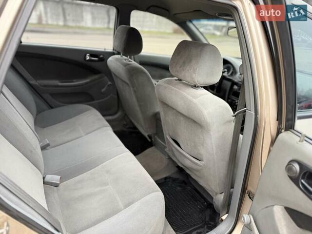 Бежевий Шевроле Лачетті, об'ємом двигуна 1.8 л та пробігом 220 тис. км за 3000 $, фото 8 на Automoto.ua