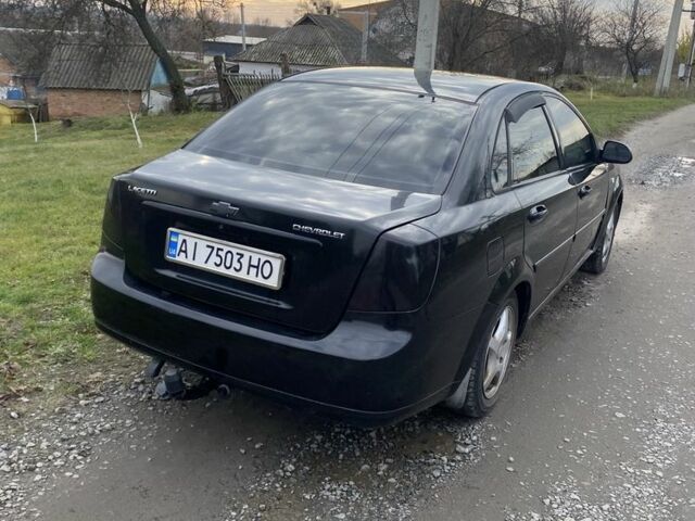 Черный Шевроле Лачетти, объемом двигателя 1.6 л и пробегом 250 тыс. км за 2600 $, фото 1 на Automoto.ua
