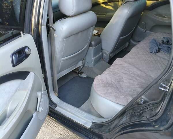 Черный Шевроле Лачетти, объемом двигателя 1.6 л и пробегом 480 тыс. км за 3800 $, фото 6 на Automoto.ua