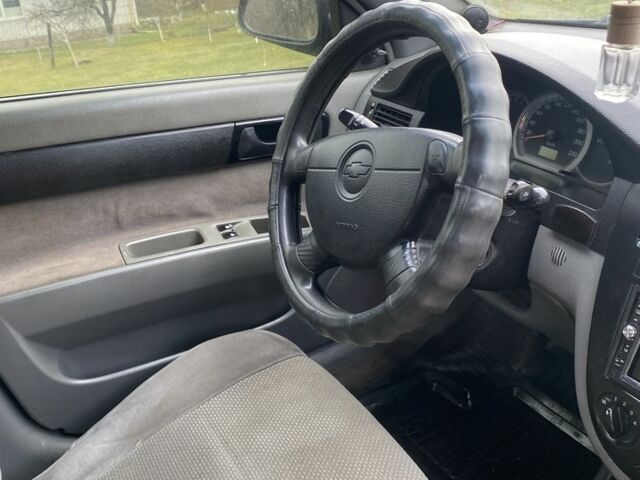 Черный Шевроле Лачетти, объемом двигателя 1.6 л и пробегом 250 тыс. км за 2600 $, фото 3 на Automoto.ua