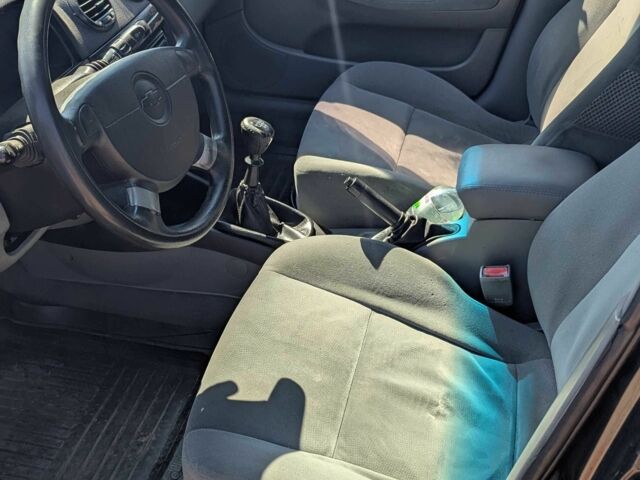 Черный Шевроле Лачетти, объемом двигателя 1.8 л и пробегом 327 тыс. км за 2800 $, фото 4 на Automoto.ua