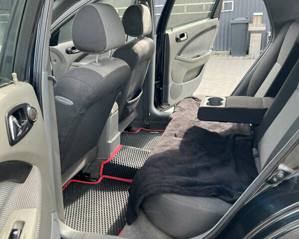 Чорний Шевроле Лачетті, об'ємом двигуна 1.8 л та пробігом 210 тис. км за 3700 $, фото 5 на Automoto.ua