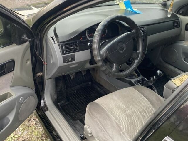 Черный Шевроле Лачетти, объемом двигателя 1.6 л и пробегом 250 тыс. км за 2600 $, фото 6 на Automoto.ua