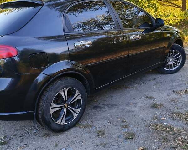 Черный Шевроле Лачетти, объемом двигателя 1.6 л и пробегом 480 тыс. км за 3800 $, фото 3 на Automoto.ua