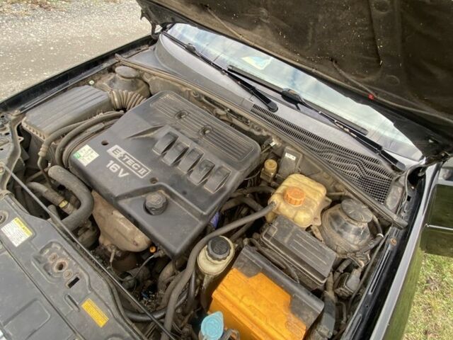 Черный Шевроле Лачетти, объемом двигателя 1.6 л и пробегом 250 тыс. км за 2600 $, фото 7 на Automoto.ua