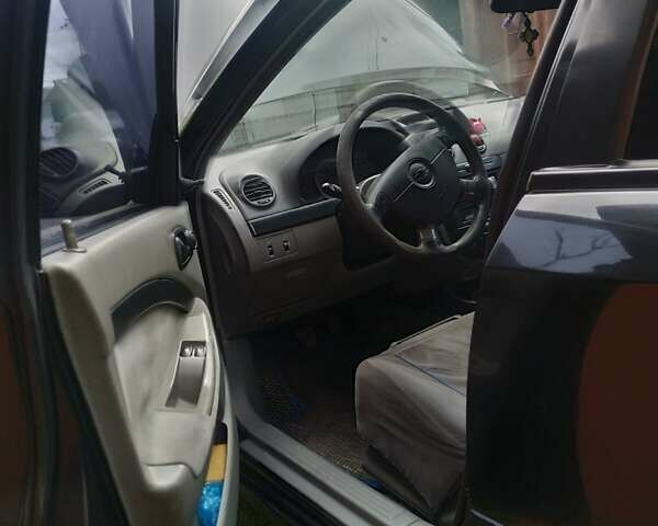 Черный Шевроле Лачетти, объемом двигателя 1.6 л и пробегом 230 тыс. км за 3400 $, фото 2 на Automoto.ua