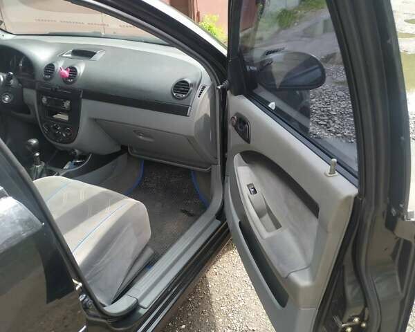 Черный Шевроле Лачетти, объемом двигателя 1.6 л и пробегом 230 тыс. км за 3400 $, фото 4 на Automoto.ua