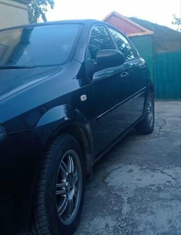 Черный Шевроле Лачетти, объемом двигателя 1.8 л и пробегом 180 тыс. км за 4100 $, фото 31 на Automoto.ua