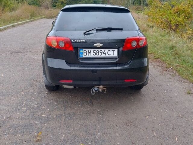 Черный Шевроле Лачетти, объемом двигателя 1.6 л и пробегом 244 тыс. км за 3600 $, фото 2 на Automoto.ua