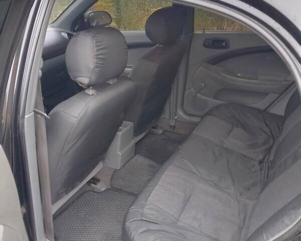 Черный Шевроле Лачетти, объемом двигателя 1.6 л и пробегом 244 тыс. км за 3600 $, фото 1 на Automoto.ua