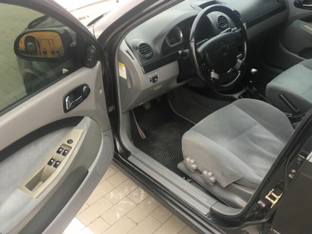 Черный Шевроле Лачетти, объемом двигателя 1.6 л и пробегом 270 тыс. км за 3500 $, фото 5 на Automoto.ua