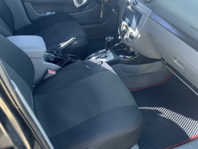 Чорний Шевроле Лачетті, об'ємом двигуна 1.8 л та пробігом 262 тис. км за 3950 $, фото 6 на Automoto.ua