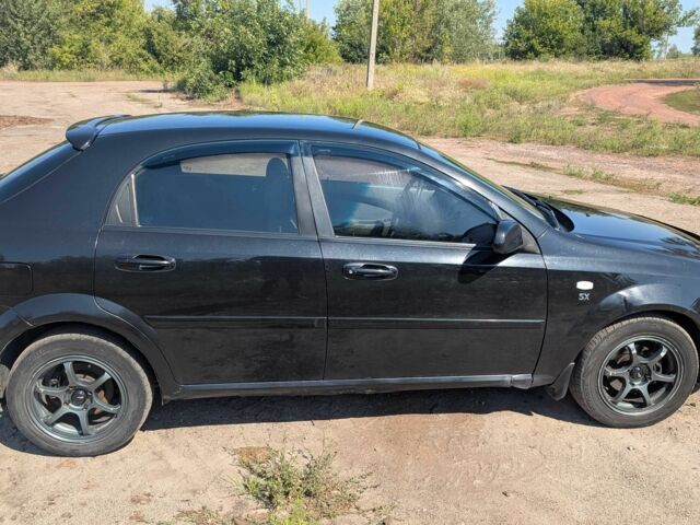 Черный Шевроле Лачетти, объемом двигателя 1.8 л и пробегом 327 тыс. км за 2800 $, фото 3 на Automoto.ua