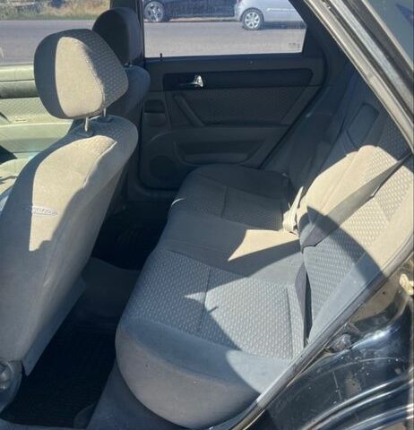 Черный Шевроле Лачетти, объемом двигателя 1.8 л и пробегом 220 тыс. км за 3200 $, фото 4 на Automoto.ua