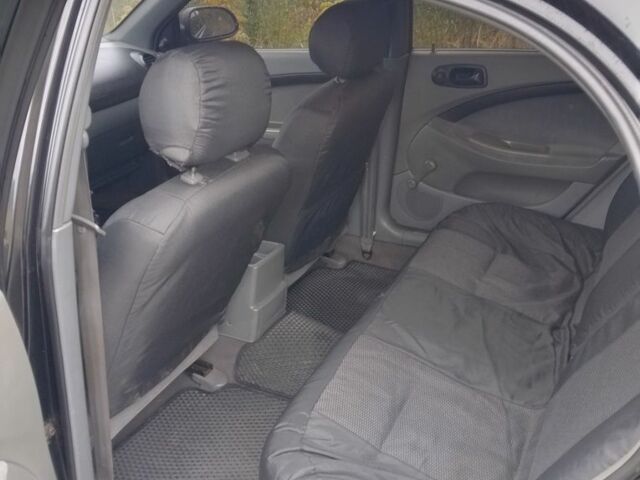 Черный Шевроле Лачетти, объемом двигателя 1.6 л и пробегом 244 тыс. км за 3600 $, фото 5 на Automoto.ua