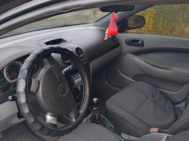 Черный Шевроле Лачетти, объемом двигателя 1.6 л и пробегом 244 тыс. км за 3600 $, фото 4 на Automoto.ua