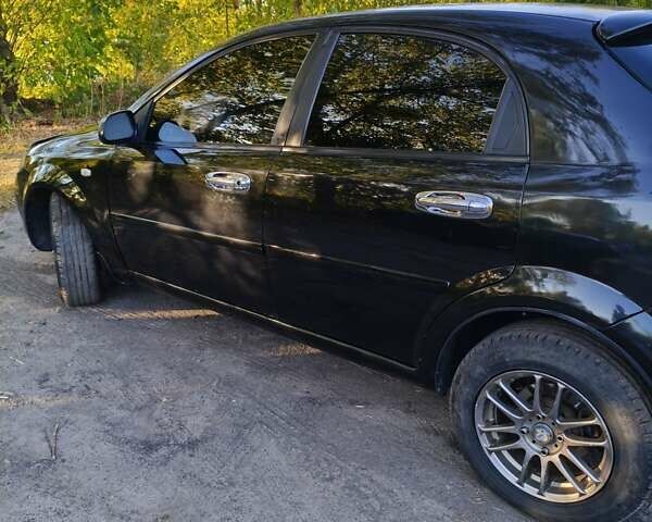 Черный Шевроле Лачетти, объемом двигателя 1.6 л и пробегом 480 тыс. км за 3800 $, фото 2 на Automoto.ua