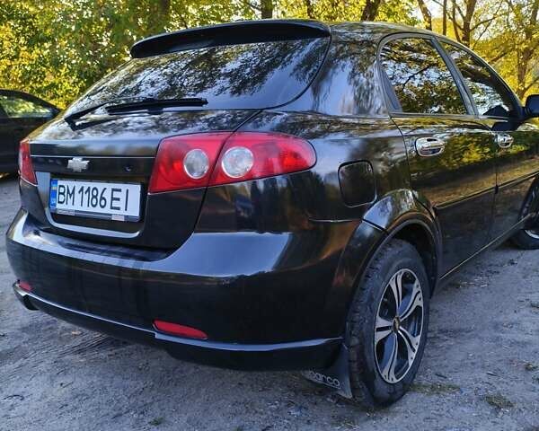 Черный Шевроле Лачетти, объемом двигателя 1.6 л и пробегом 480 тыс. км за 3800 $, фото 4 на Automoto.ua