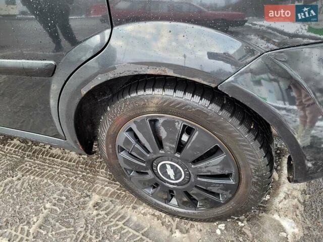 Черный Шевроле Лачетти, объемом двигателя 1.6 л и пробегом 232 тыс. км за 4700 $, фото 13 на Automoto.ua