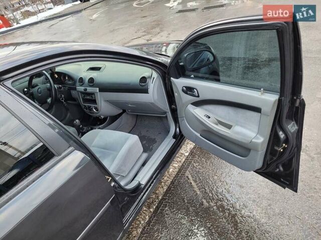 Черный Шевроле Лачетти, объемом двигателя 1.6 л и пробегом 232 тыс. км за 4700 $, фото 16 на Automoto.ua