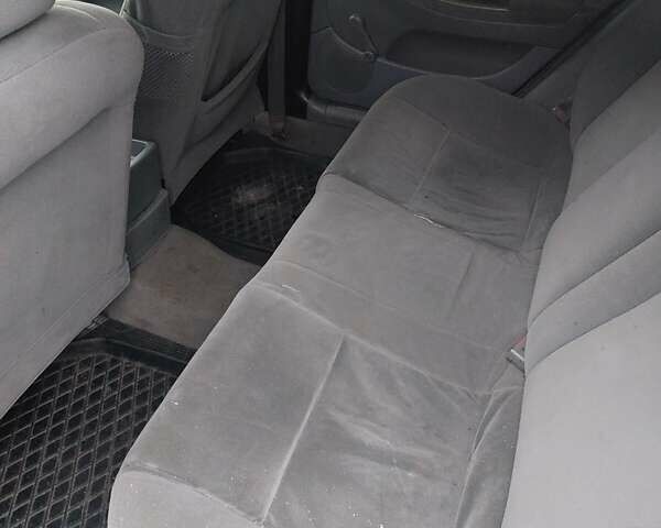 Черный Шевроле Лачетти, объемом двигателя 1.6 л и пробегом 200 тыс. км за 2999 $, фото 4 на Automoto.ua