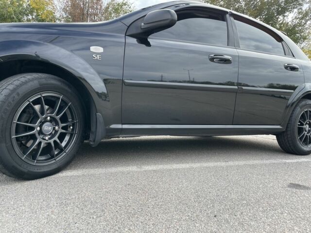 Черный Шевроле Лачетти, объемом двигателя 1.6 л и пробегом 144 тыс. км за 5100 $, фото 11 на Automoto.ua