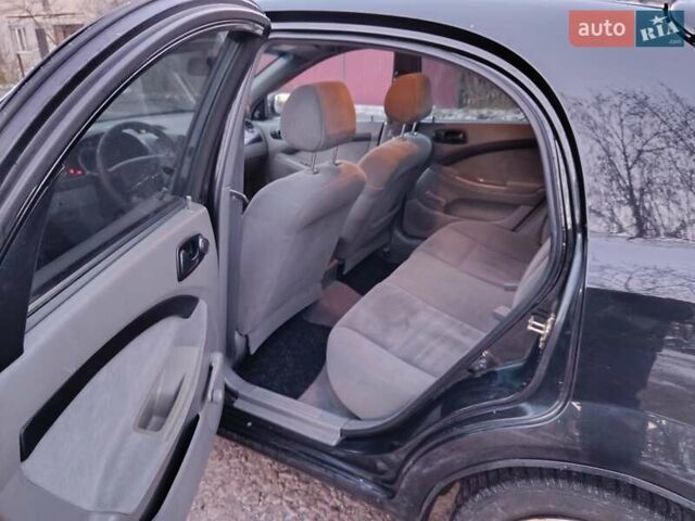 Черный Шевроле Лачетти, объемом двигателя 1.6 л и пробегом 150 тыс. км за 3400 $, фото 14 на Automoto.ua