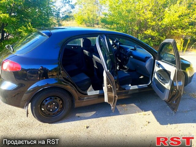 Черный Шевроле Лачетти, объемом двигателя 1.8 л и пробегом 233 тыс. км за 3200 $, фото 5 на Automoto.ua