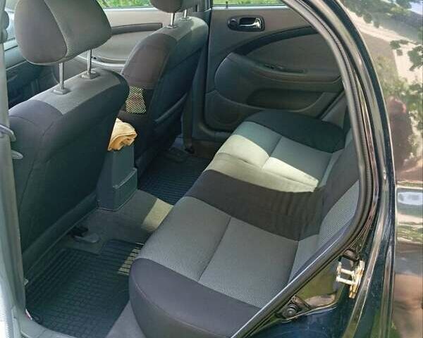 Черный Шевроле Лачетти, объемом двигателя 1.8 л и пробегом 218 тыс. км за 4200 $, фото 2 на Automoto.ua