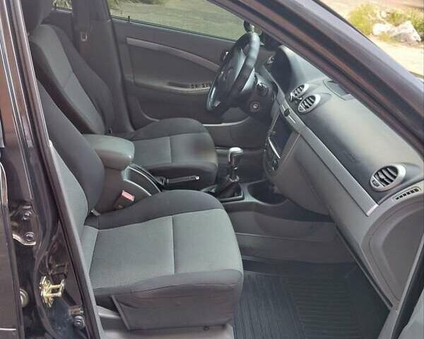 Черный Шевроле Лачетти, объемом двигателя 1.8 л и пробегом 268 тыс. км за 4400 $, фото 16 на Automoto.ua