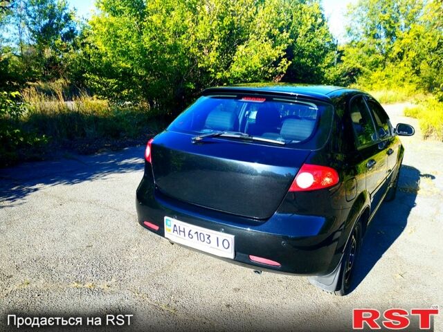 Черный Шевроле Лачетти, объемом двигателя 1.8 л и пробегом 233 тыс. км за 3200 $, фото 8 на Automoto.ua