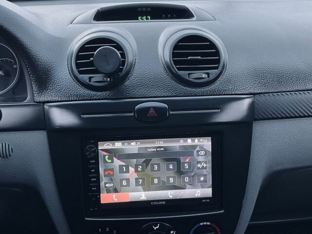 Черный Шевроле Лачетти, объемом двигателя 1.6 л и пробегом 144 тыс. км за 5100 $, фото 6 на Automoto.ua