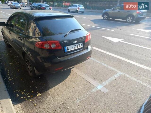 Черный Шевроле Лачетти, объемом двигателя 1.6 л и пробегом 284 тыс. км за 3700 $, фото 3 на Automoto.ua
