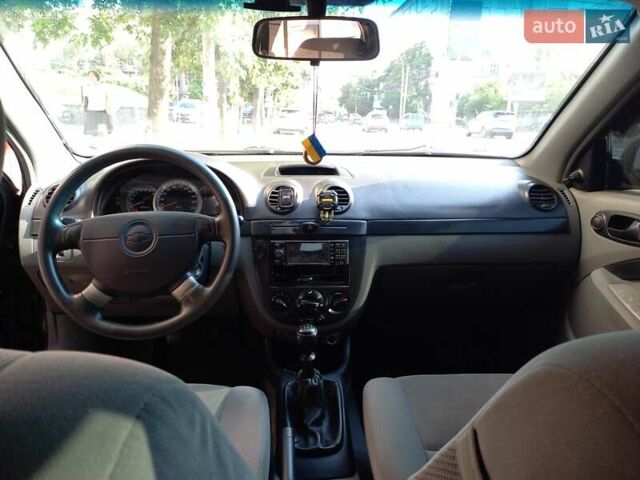 Черный Шевроле Лачетти, объемом двигателя 1.6 л и пробегом 284 тыс. км за 3700 $, фото 6 на Automoto.ua