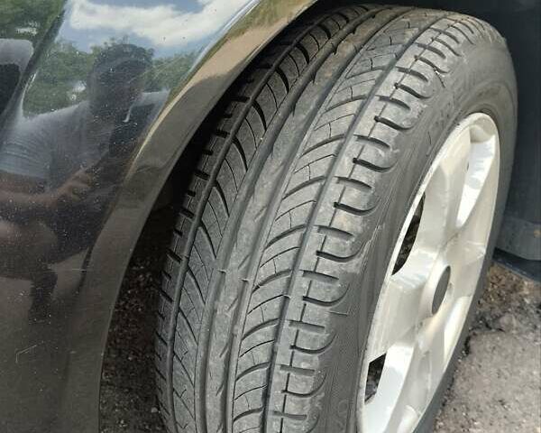 Черный Шевроле Лачетти, объемом двигателя 1.8 л и пробегом 268 тыс. км за 4400 $, фото 7 на Automoto.ua